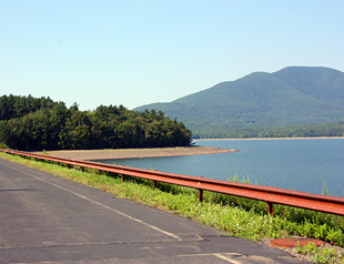 Photo of roadway next to a body of water